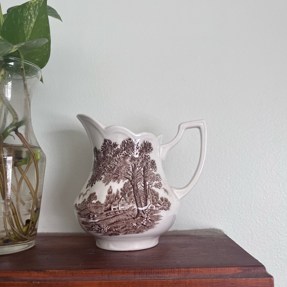 Scenic Brown and White Ceramic Pitcher